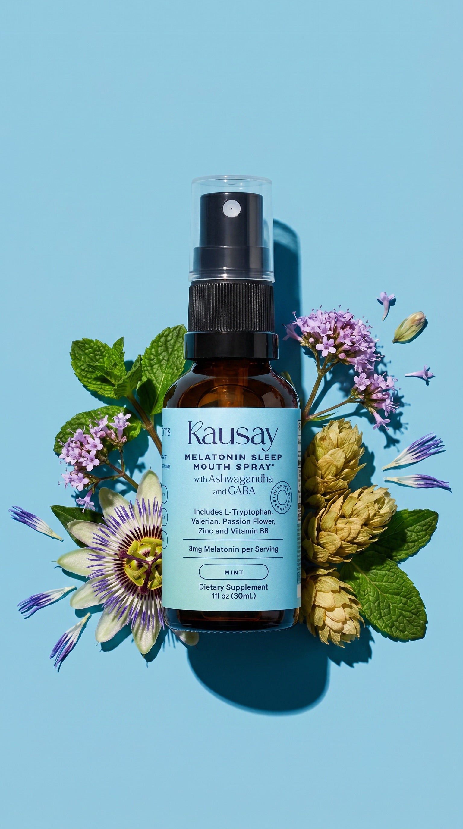 Kausay melatonin sleep mouth spray bottle with passion flower, mint, valerian, and hops on a blue background